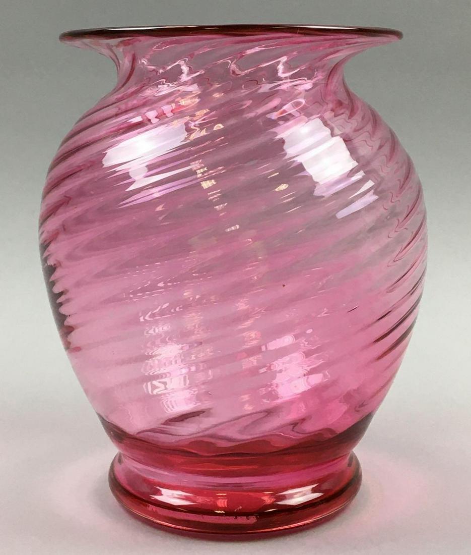 Steuben Optic Swirl Gold Ruby Vase #6424: This attractive 1920's-era (Carder design #6424) Steuben Optic Swirl Gold Ruby Vase measures 7 x 5 inches. The vase is unsigned w/ a ground andpolished pontil; and is in overall exceptional condition 