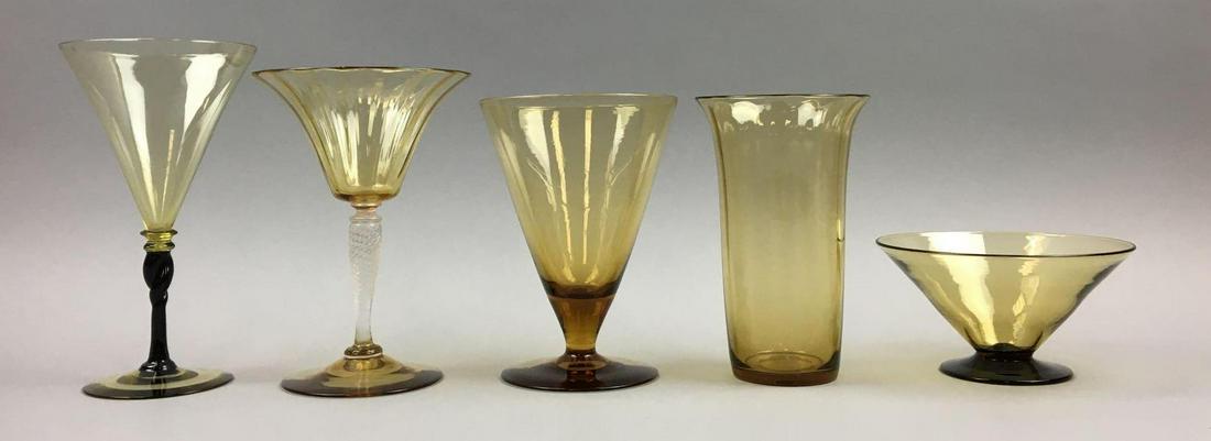 Steuben Amber Collection of 5 : Goblets, Vase, and: Tallest Steuben Amber Goblet with Black Twist Stem measures 7-1/4 inches; Shortest Amber footed Bowl w/ Cranberry Foot measures 2-1/2 x 5 inches. Excellent vintage condition, no chips or flaws