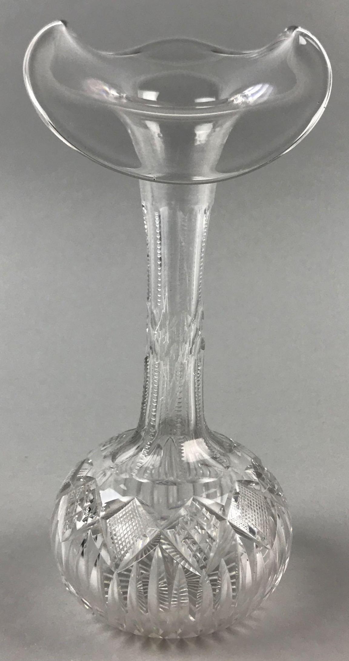 American Brilliant Period Cut Glass Flared Rim Round: 8 1/2 inches tall. Crosshatch pattern; scratches inside neck of vase and minor base scuffing