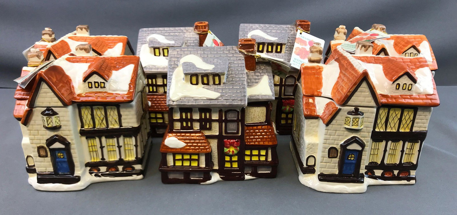 Group of 7 : Ceramic House-shaped Cookie Jars: 6 x 5 1/2 inches