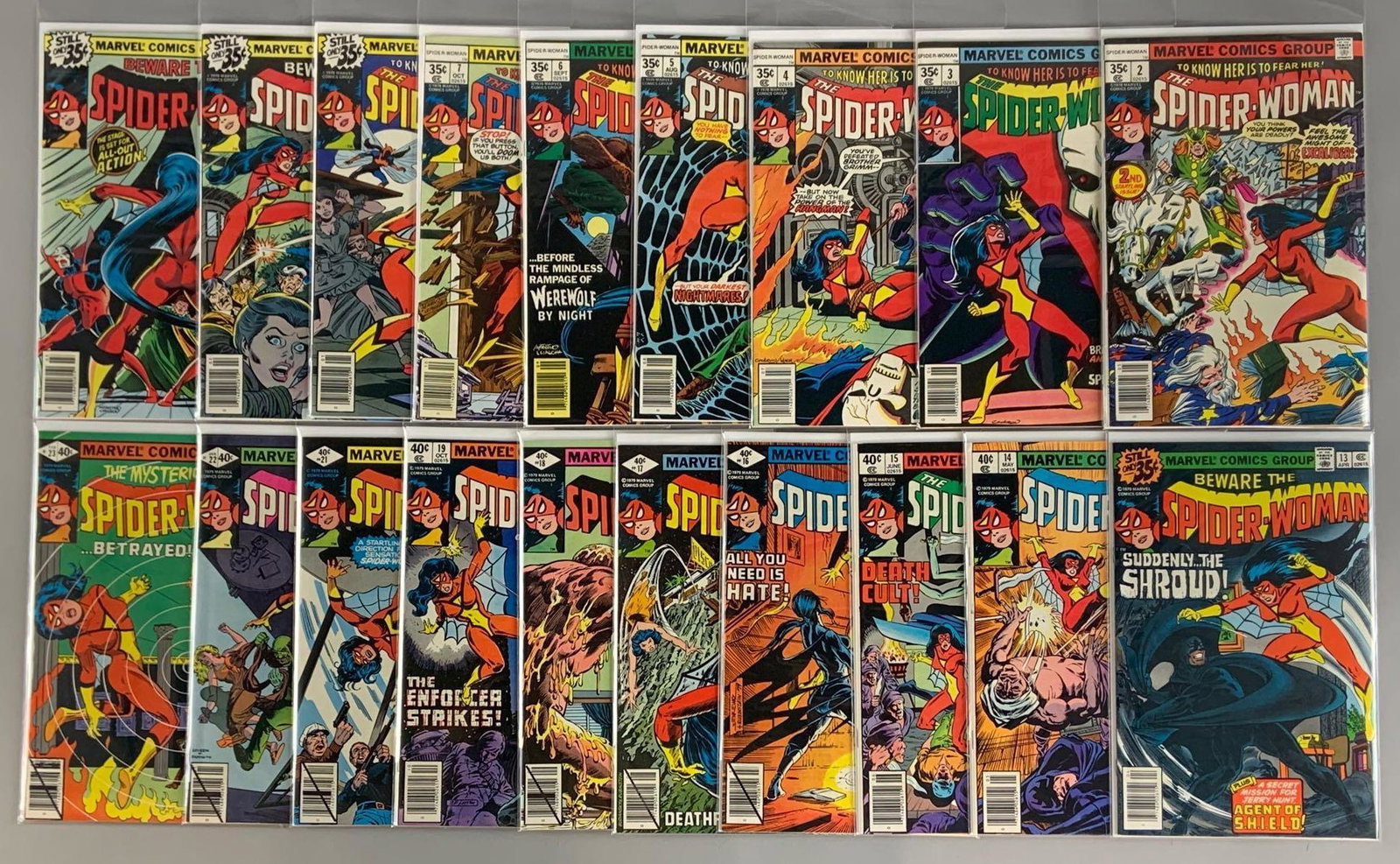 Group of 19 Marvel Comics The Spider-Woman Comic Books: Includes No. 2-7, 10-19, and 21-23, Featuring 1st appearance of Morgan LeFay; 1st appearance of Excaliber, 1st appearance of Brothers Grimm (Jacob Dolly & William Dolly), 1st appearance of Gypsy Moth;