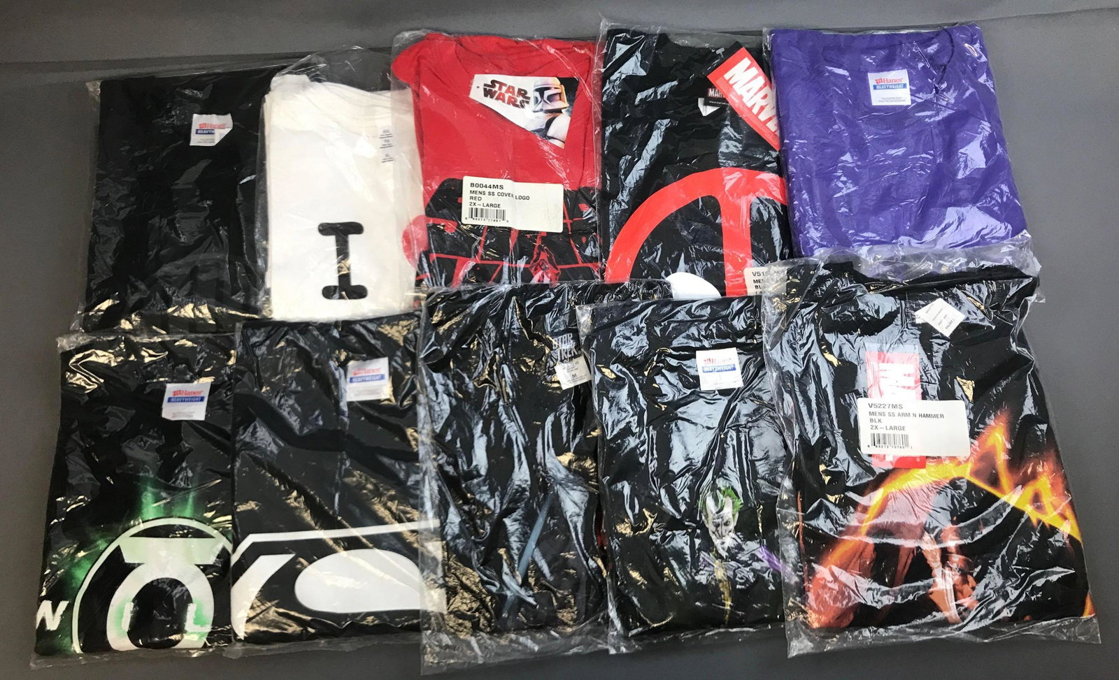 Group of 10 T-shirts including joker and Superman: Sizes from M to 2XL, Green Lantern, zombies, Star Trek, Star Wars, and more