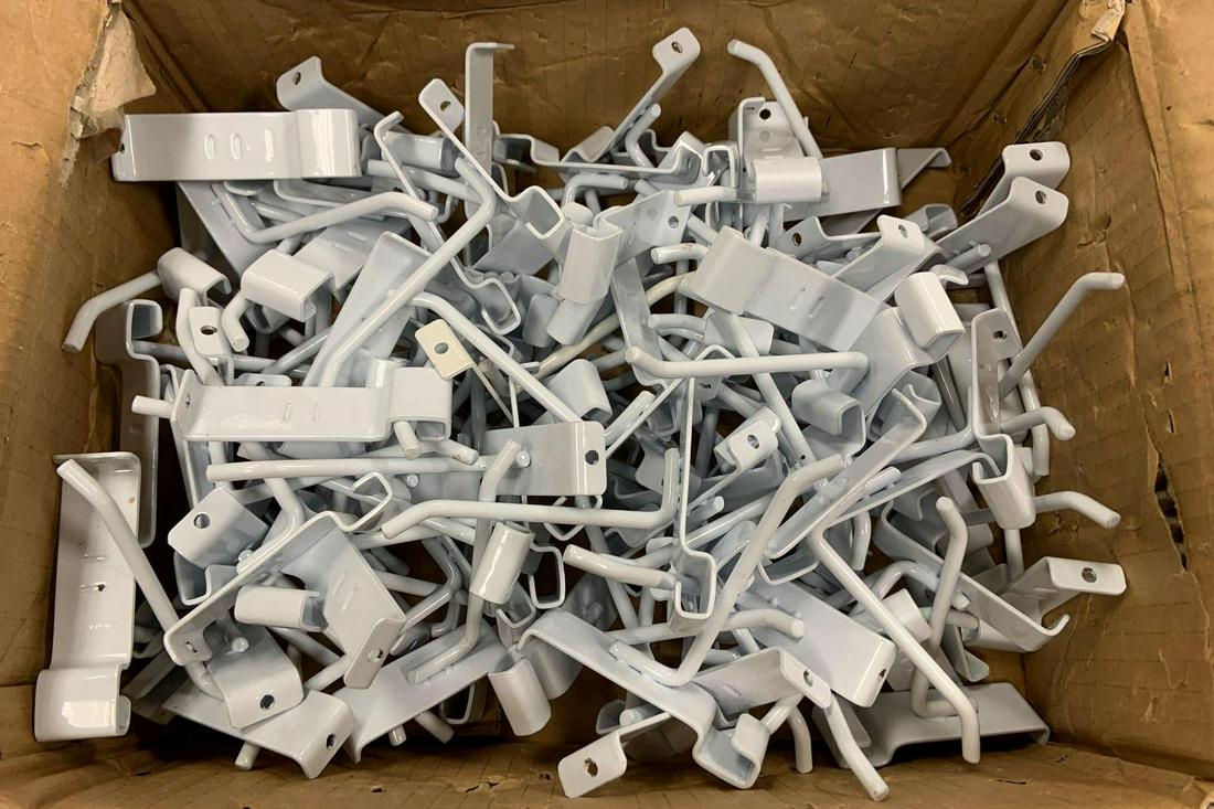 Group of 4 inch white grid wall hooks: Approximately 30+
