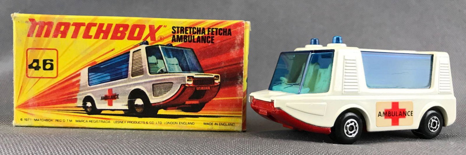 Matchbox Superfast No. 46 Stretcha Fetcha Ambulance: White body, red base, blue windows, BPW, Ambulance decals. A Lesney Product. Made in England