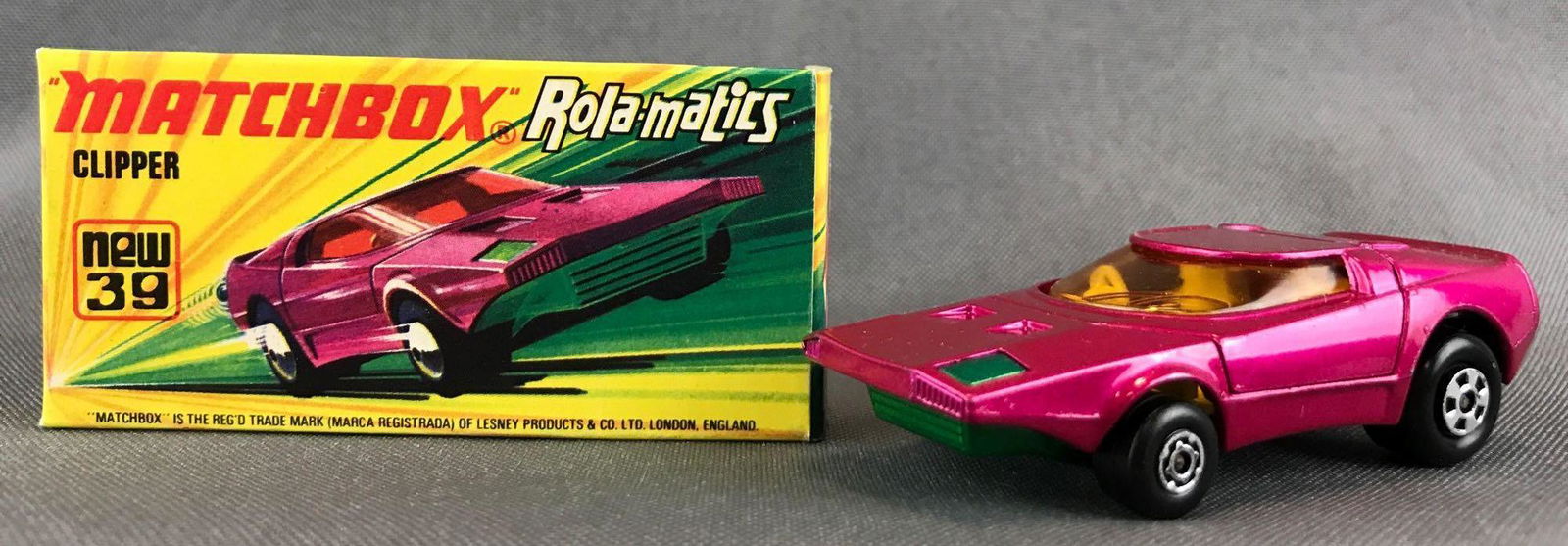 Matchbox Rola-Matics No. 39 Clipper Die-Cast Vehicle: Purple body, green base, amber windows, BPW. A Lesney Product. Made in England