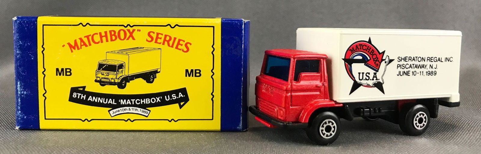 8th Annual Matchbox U.S.A. Convention Dodge Commando: Red body, blue windows, BPW. New in original packaging, some shelf wear. A Lesney Product. Made in Macau