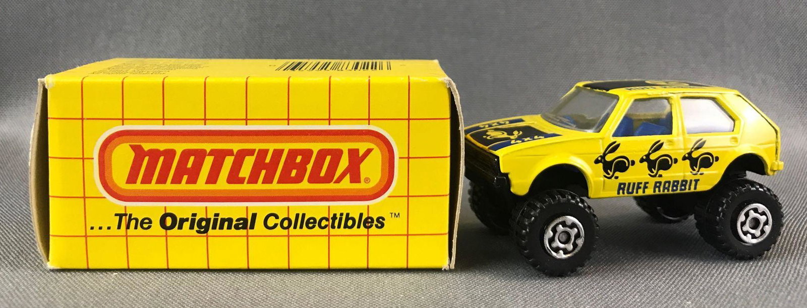 Matchbox No. 7 Ruff Rabbit Die-Cast Vehicle with: Romping Rabbit. Yellow body, blue windows, BPW. 4x4, VW, Ruff Rabbit decals. A Lesney Product. Made in England