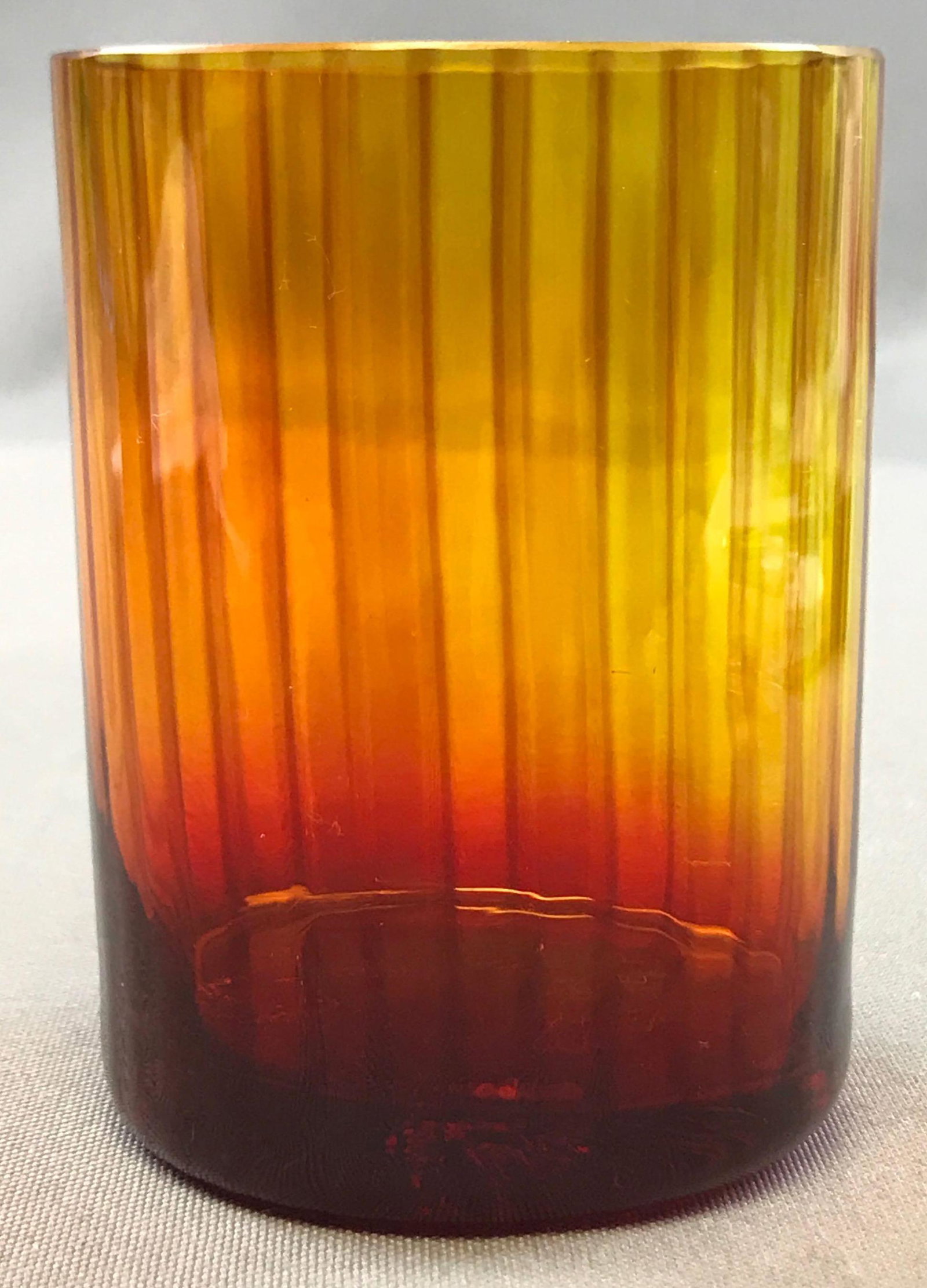 Early Amberina Glass Tumbler: 3 1/4 inches tall; striped pattern. Scuffed on bottom consistent with age -Ê no chips or cracks