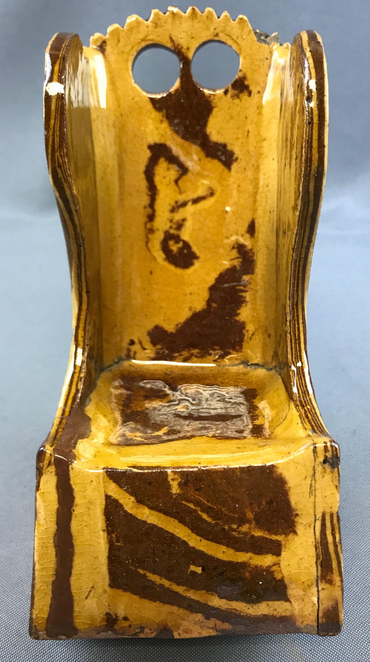 Vintage Hand Formed Yellow Ware Rocking Chair: 6 3/4 inches tall; some chips and cracks - crazing throughout