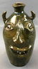 Emma Flowers : Artist Signed Pottery Face Jug - Green