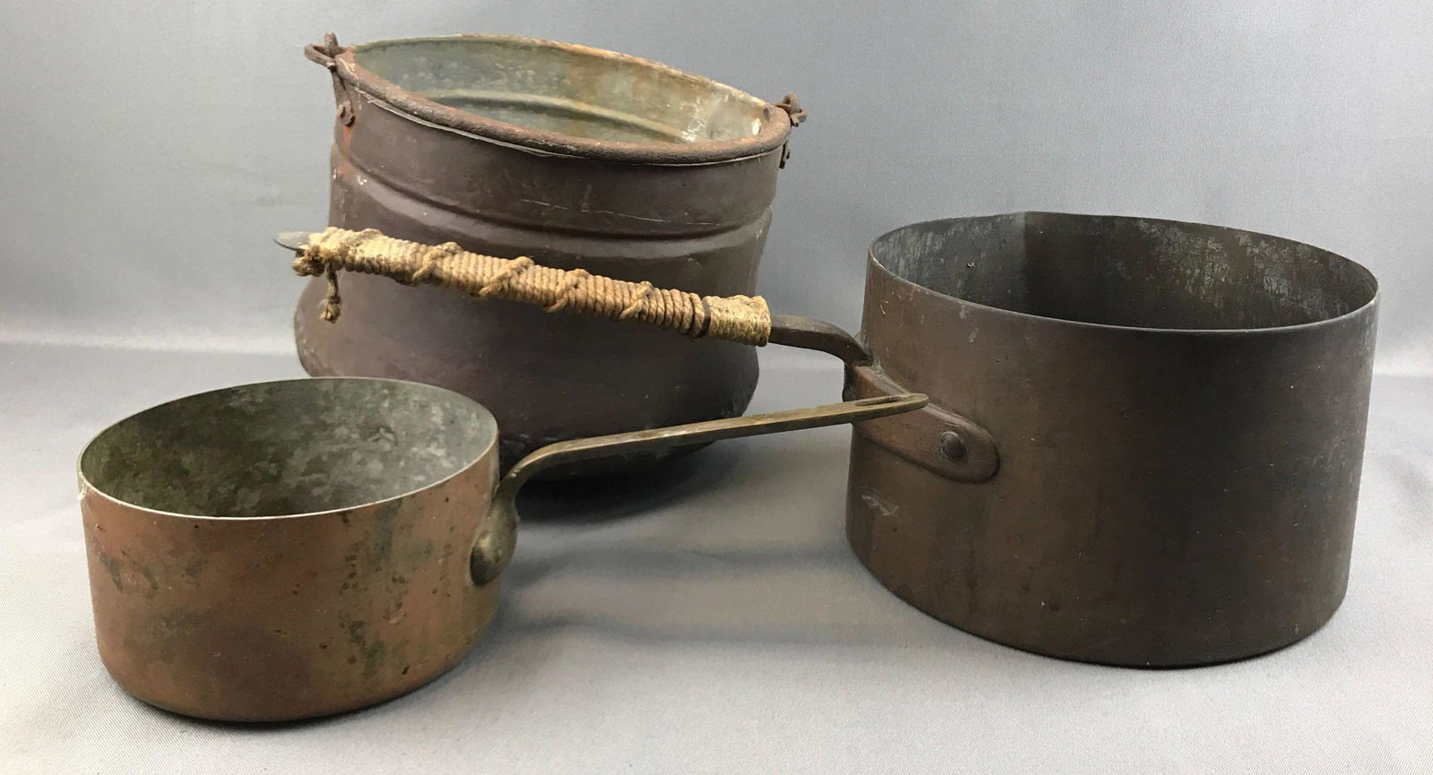 Group of 3 : Vintage Copper and Other Metal Pots: Kettle pot with handle. Large pot with pour spout. Smallest pot has brass handle, 6 1/2 diameter