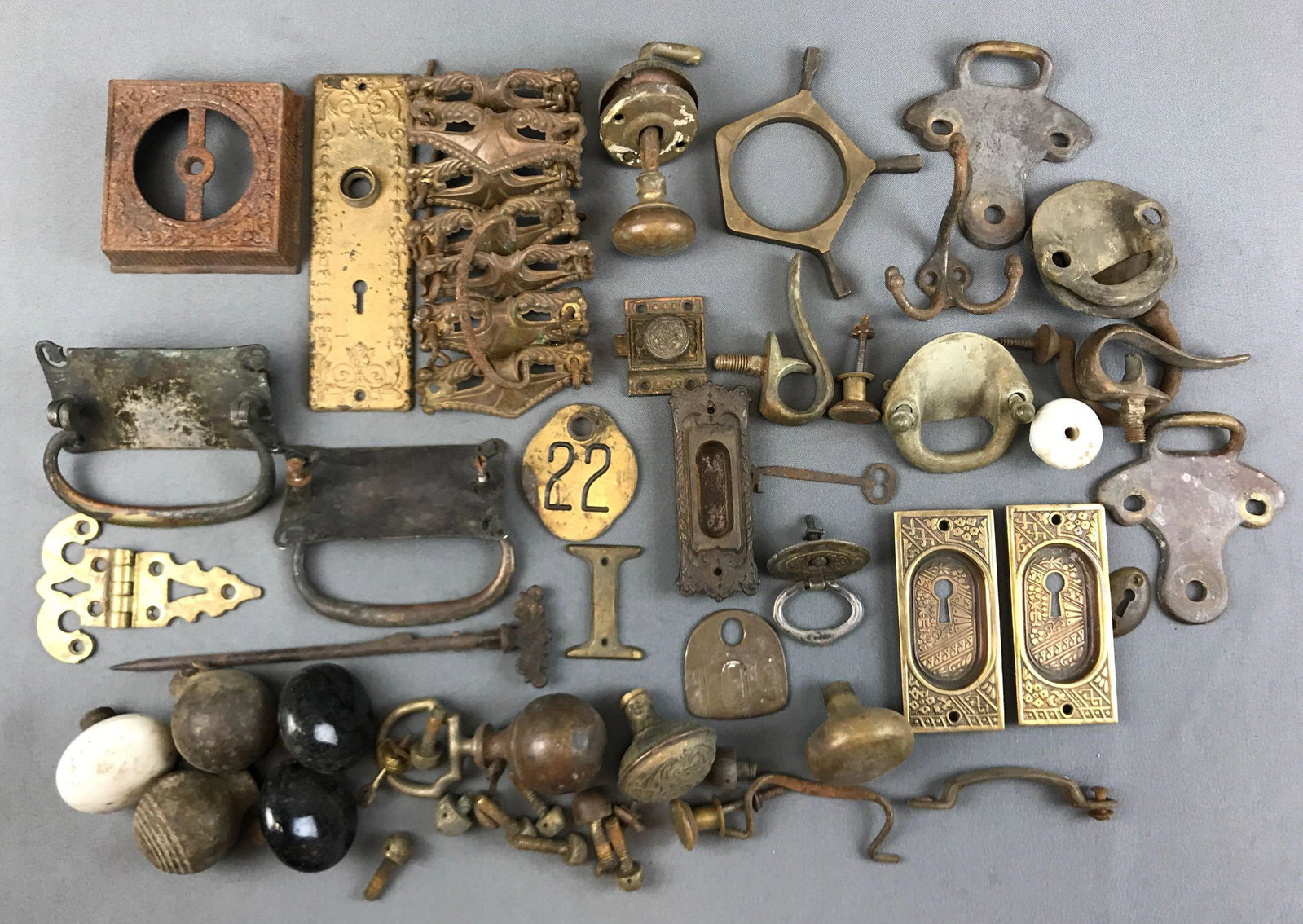 Group of Antique Hardware: Includes doorknobs, drawer pulls, hooks and more