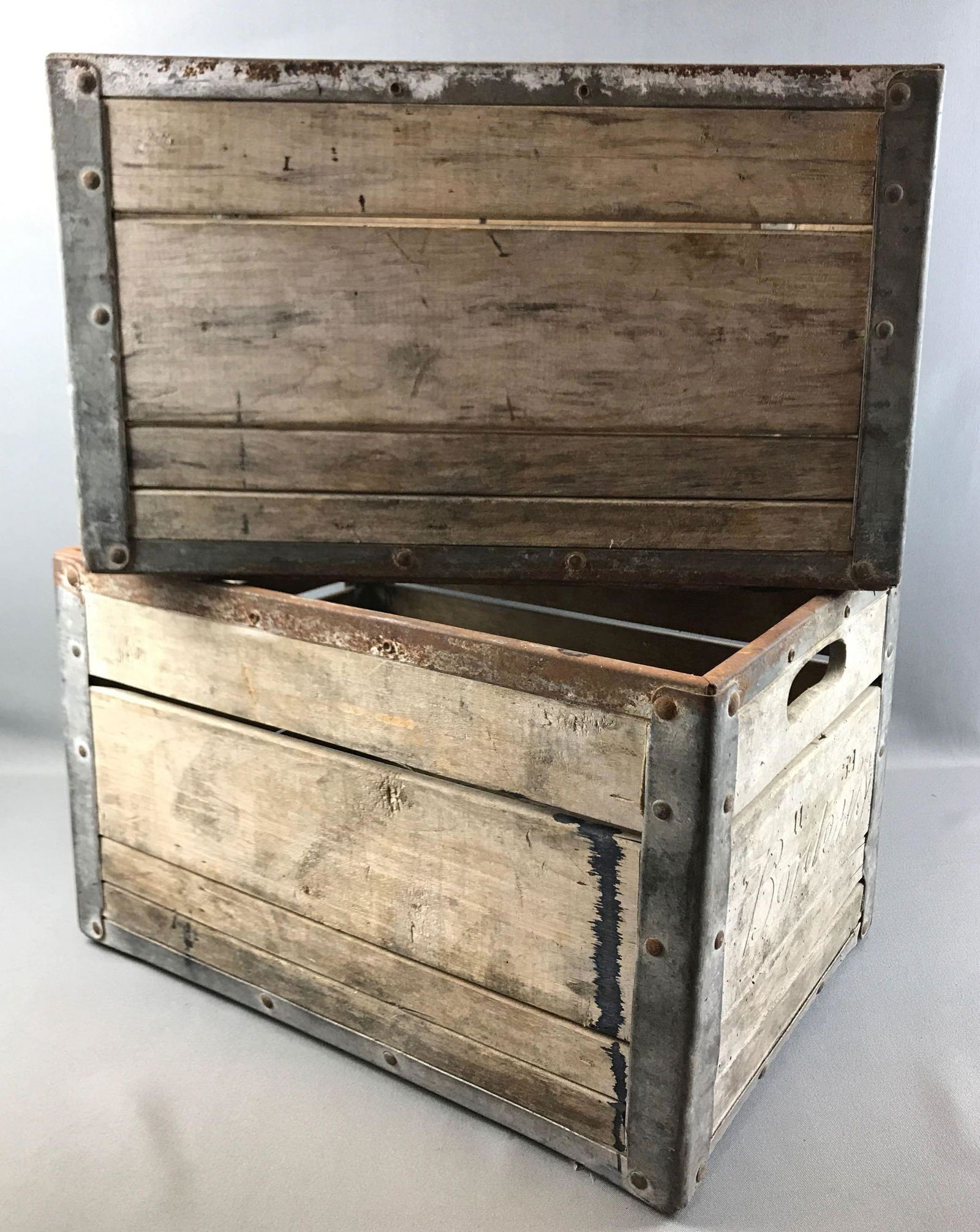 Lot of 2: Vintage Borden's Crates: 19 x 13 x 11 1/2 inches. Wooden with metal bottoms and edges. Heavyweight. One labeled 5/58, one 11/59.