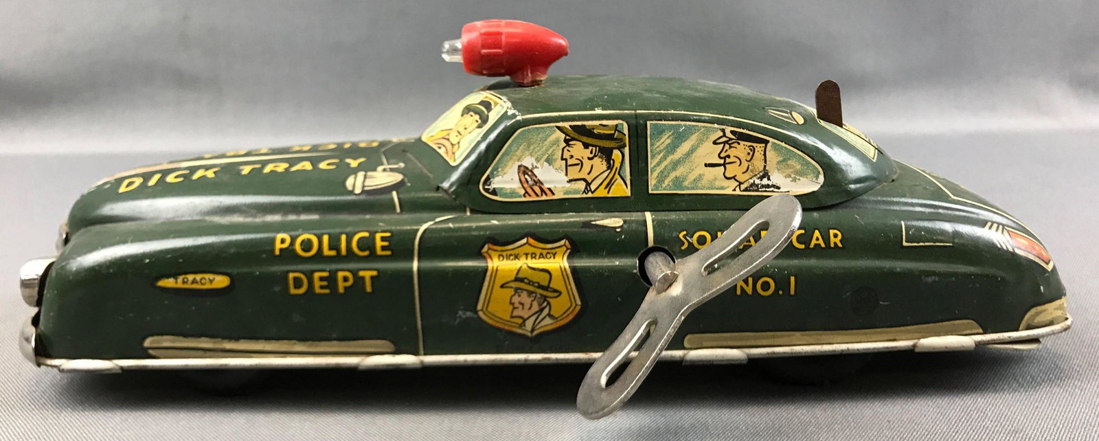 Vintage (1949) Marx Tin "Dick Tracy" Wind-up Car: 11 inches long; winds and wheel turns - used condition