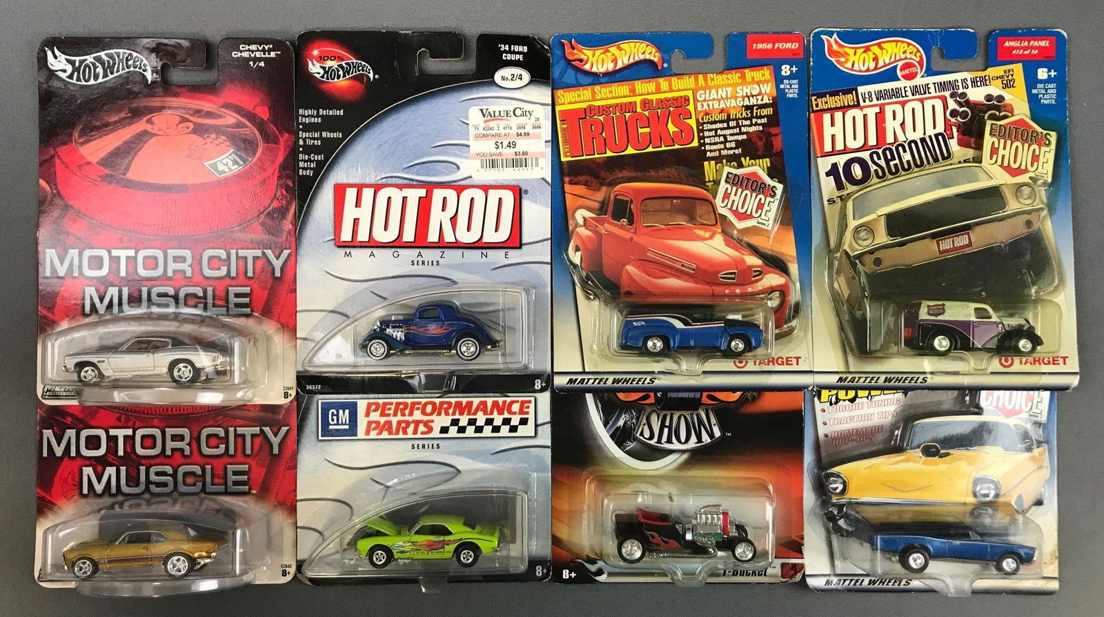 Group of 8 Hot Wheels Die-Cast Vehicles: New in original packaging. Motor City Muscle, GM Performance Parts, Street Show, Hot Rod Magazine, and Target Exclusives: Car Craft, Hot Rod, and Petersens Custom Classic Trucks