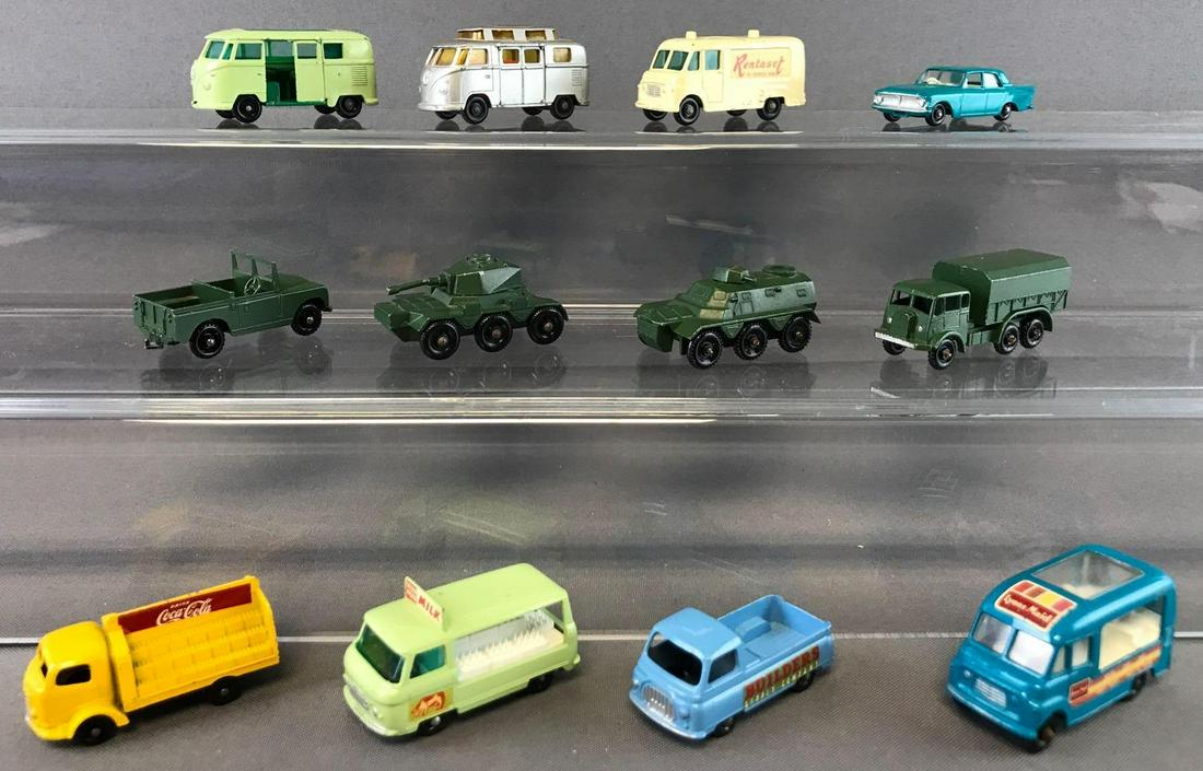 Group of 12 Matchbox Die-Cast Vehicles: Includes No. 12 Land Rover, No. 14 Ice Cream Canteen, No. 34 Volkswagen Camper, and more. Also included-12 car capacity carry case