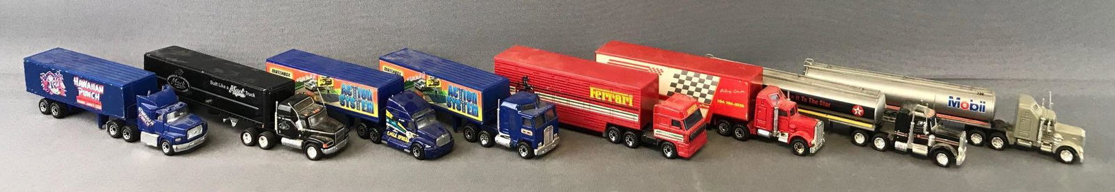 Group of 8 Matchbox Die-Cast Vehicles: Tractor-Trailers. Includes Ford Aeromax and Articulated Trailer, DAF 3300 Space Cab and Low Bed Trailer, Kenworth Aerodyne Tanker, and more