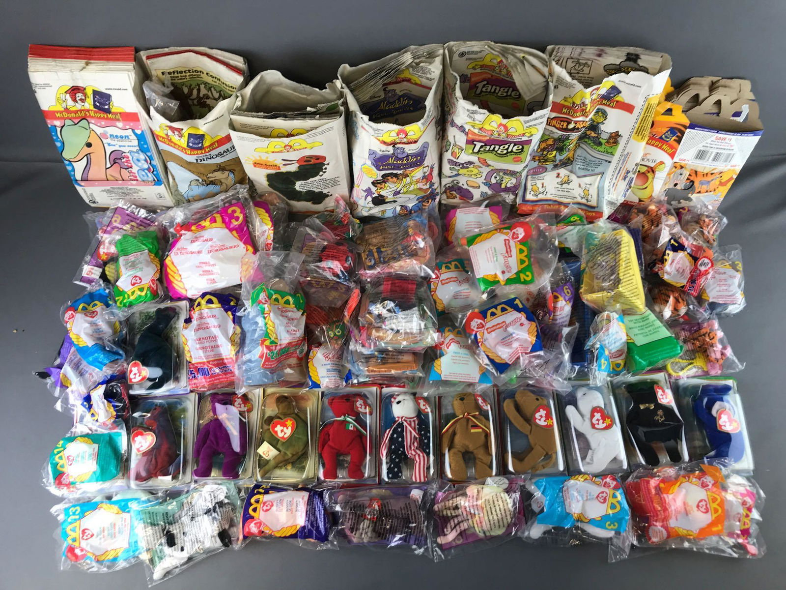 Group of 70+ pieces McDonalds Happy Meal Toys, boxes,: Teenie Beanies, Eric Carle, The Tigger Movie, and more