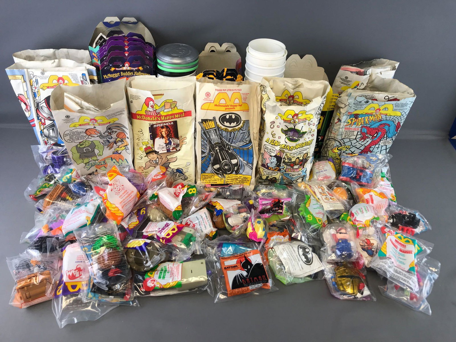 Group of 70+ McDonalds Happy Meal Toys, boxes, bags,: Batman, Mighty Morphing Power Rangers, Marvel Super Heroes, and more