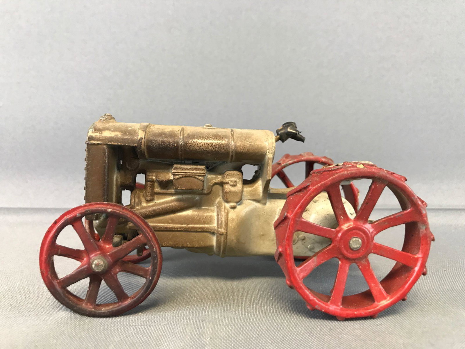 Vintage Fordson Toy Tractor: Very weathered, damaged steering wheel