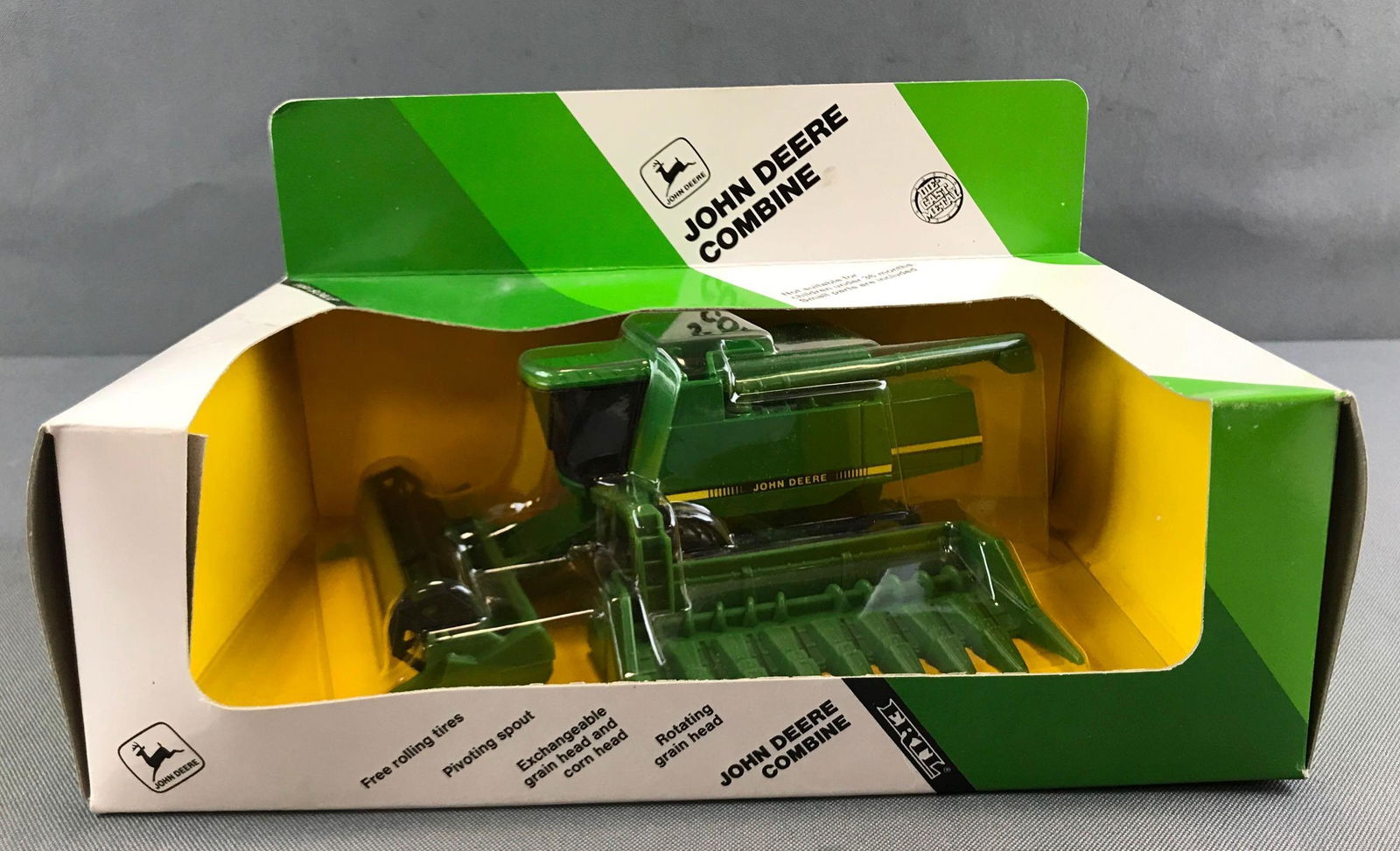 ERTL John Deere die cast combine: New in original packaging, 1/64 scale.