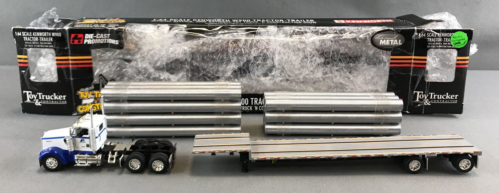 Die cast promotions Pacific Corrugated pipe tractor: 1:64 scale. Official replica 2006 national toy truck n construction show. 2006 FF Ertl III