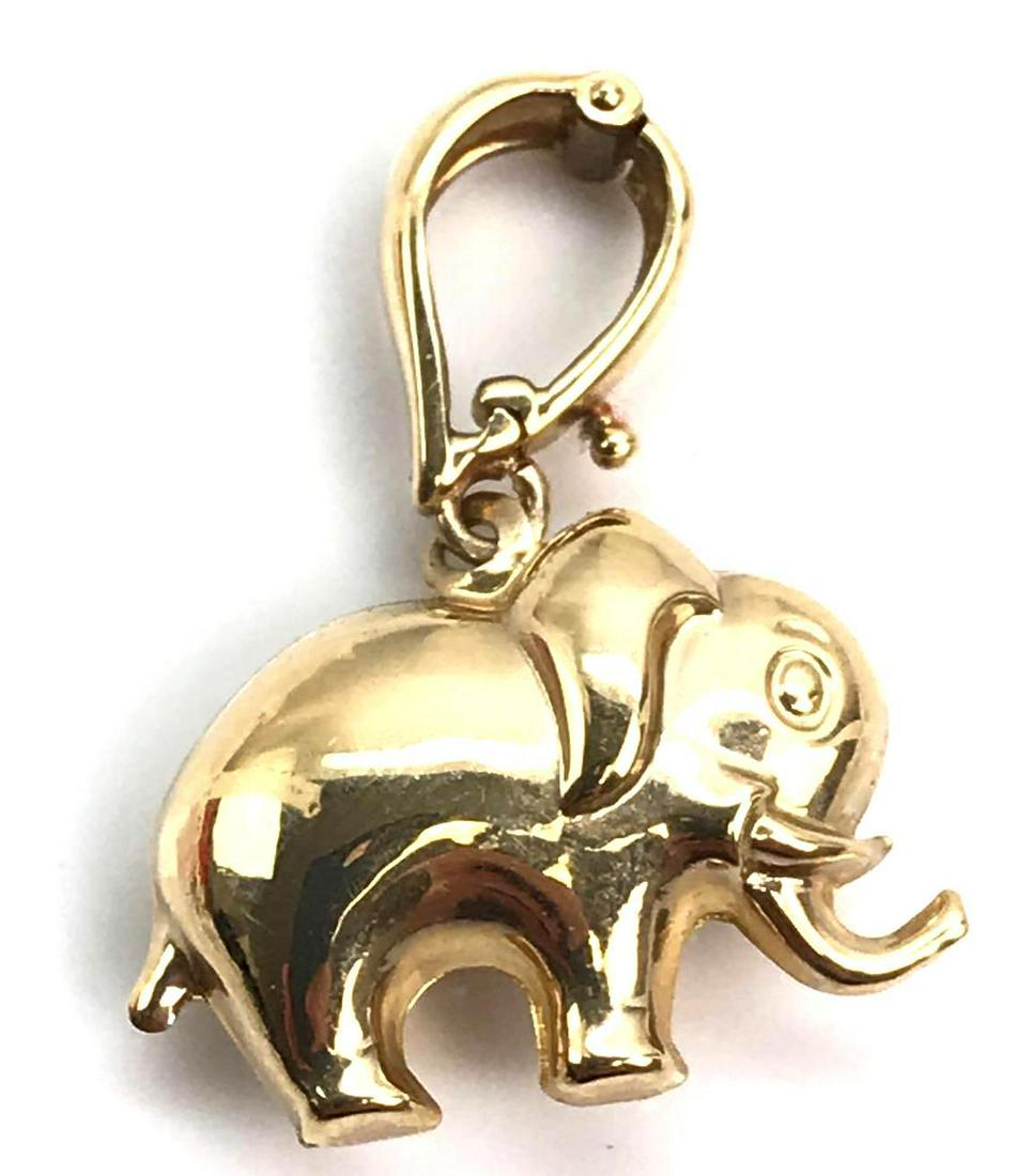 14k Yellow Gold Elephant Pendant - Milor: 14k yellow gold elephant pendant measures 1 x 1 inch and secures with a lever locking hinged bail. Hallmarked Milor Italy 14k and weighs 2.2g