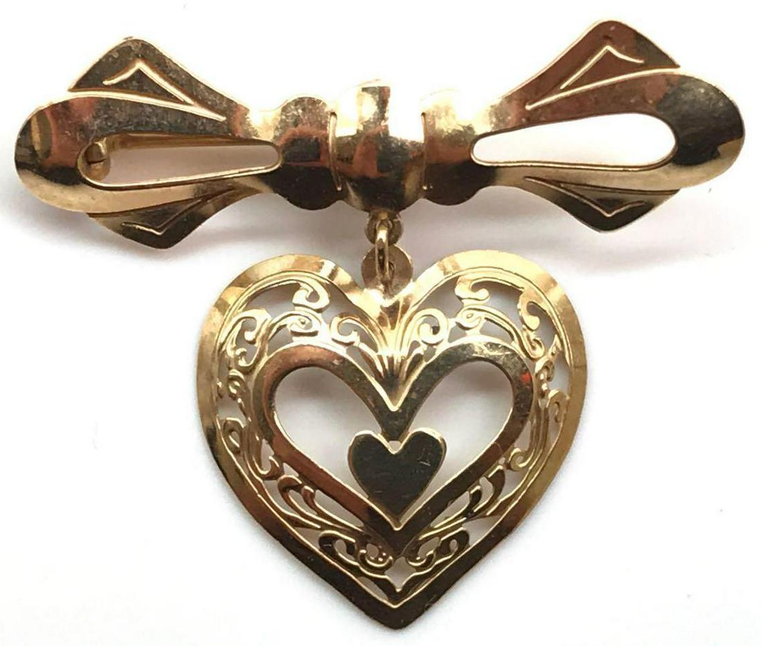 14k Yellow Gold Heart Bar Pin: The diminutive 14k yellow gold bar pin with heart design measures 3/4 x 1 inch and weighs 1.2g