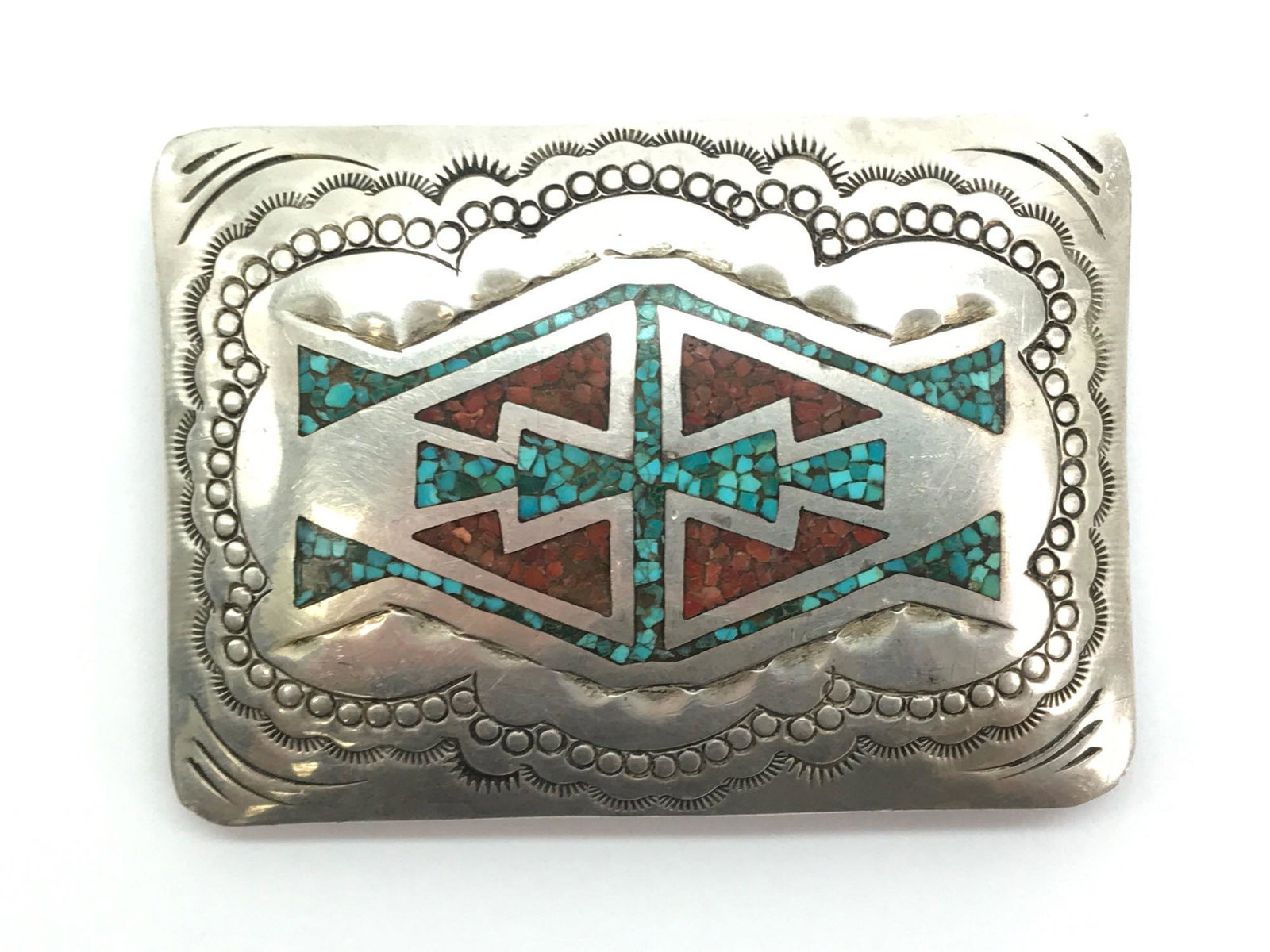 Vintage Sterling Silver Belt Buckle w/ Turquoise and: 2 1/8 x 3 inches; sterling silver belt buckle features traditional southwest style, a detailed crushed turquoise and coral inlay central design and weighs 43.9g