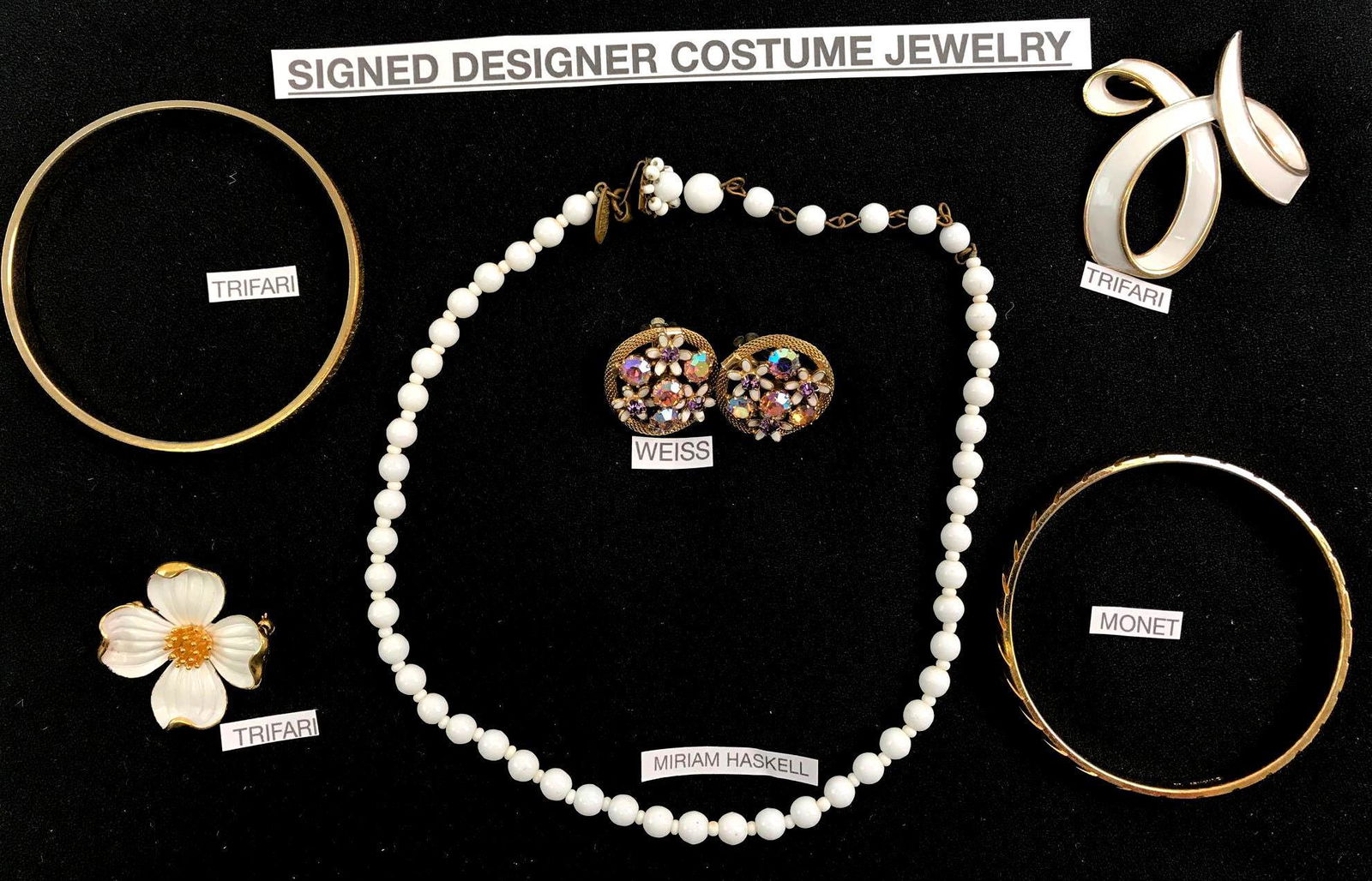 Designer Costume Jewelry Lot - Trifari Weiss, Haskell +: Designer Costume Jewelry Lot - Trifari Weiss, Mirium Haskell and Monet. A vintage collection of designer jewelry includes tow "Trifari" brooches ( larger freeform brooch measures 1 3/4 x 1 3/4 inches;