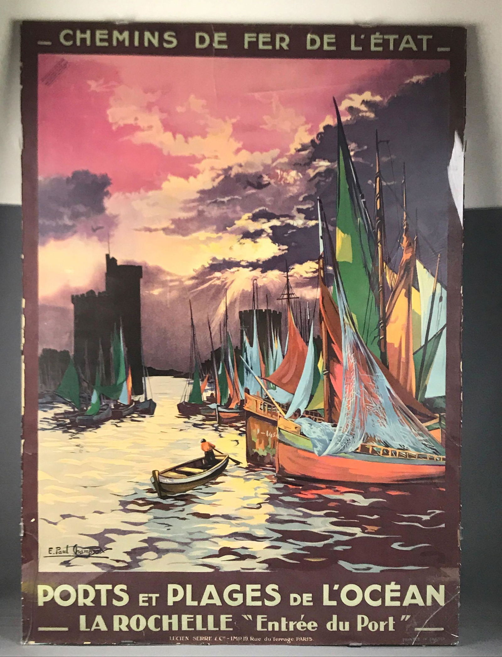 Chemins de fer De Letat vintage French poster: Travel poster by E Paul Champseix, printed in France. Under glass, 2 corners of glass are cracked. Poster shows wear from age/use. 29 1/4 x 41 1/4 inches.