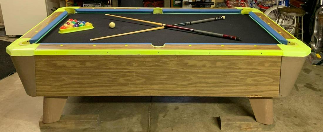 Valley Cougar Black Light Pool/Billiards Table with: 53 x 93 x 30 1/2 inches, Glows Under a Black Light!, Missing 2 feet, needs new felt with some damage to existing felt. Includes Pool Sticks and Black Light Balls. Missing internal mechanism and coin m