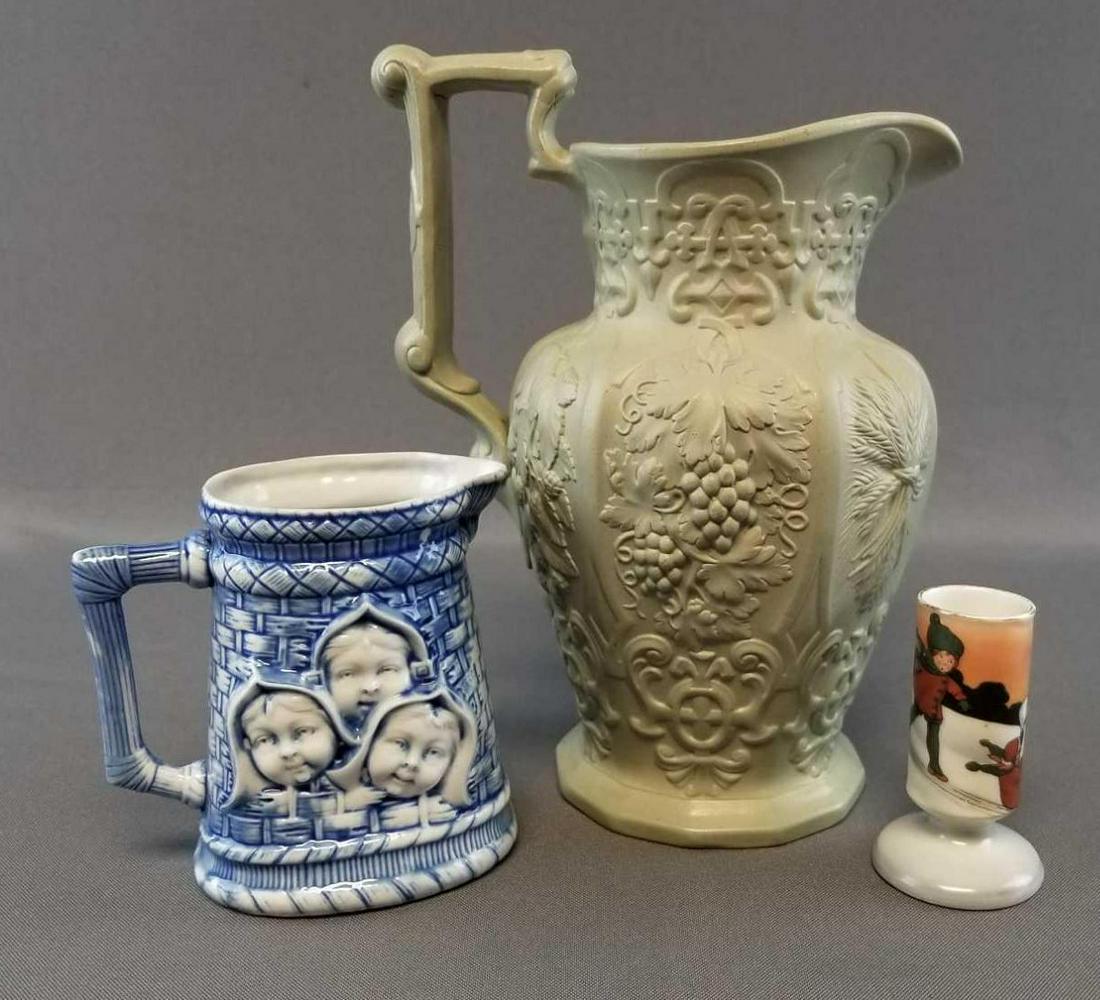 Group of 3: Vintage Jug, Creamer: Lot includes Schafer and Vater blue glaze creamer, Royal Bayreuth toothpick holder and an 8 1/2 inch stoneware jug with relief design - no chips or cracks