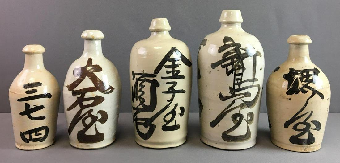 Group of 5 : Vintage Stoneware Bottles with Japanese: Largest is 11 inches tall