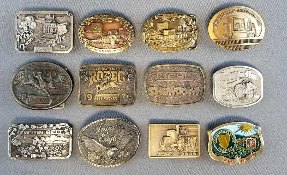 Group of 12: Vintage Belt Buckles: Lot includes: HesstonRodeo, John Deere, Cotton Belt IH, Case, Funks and more