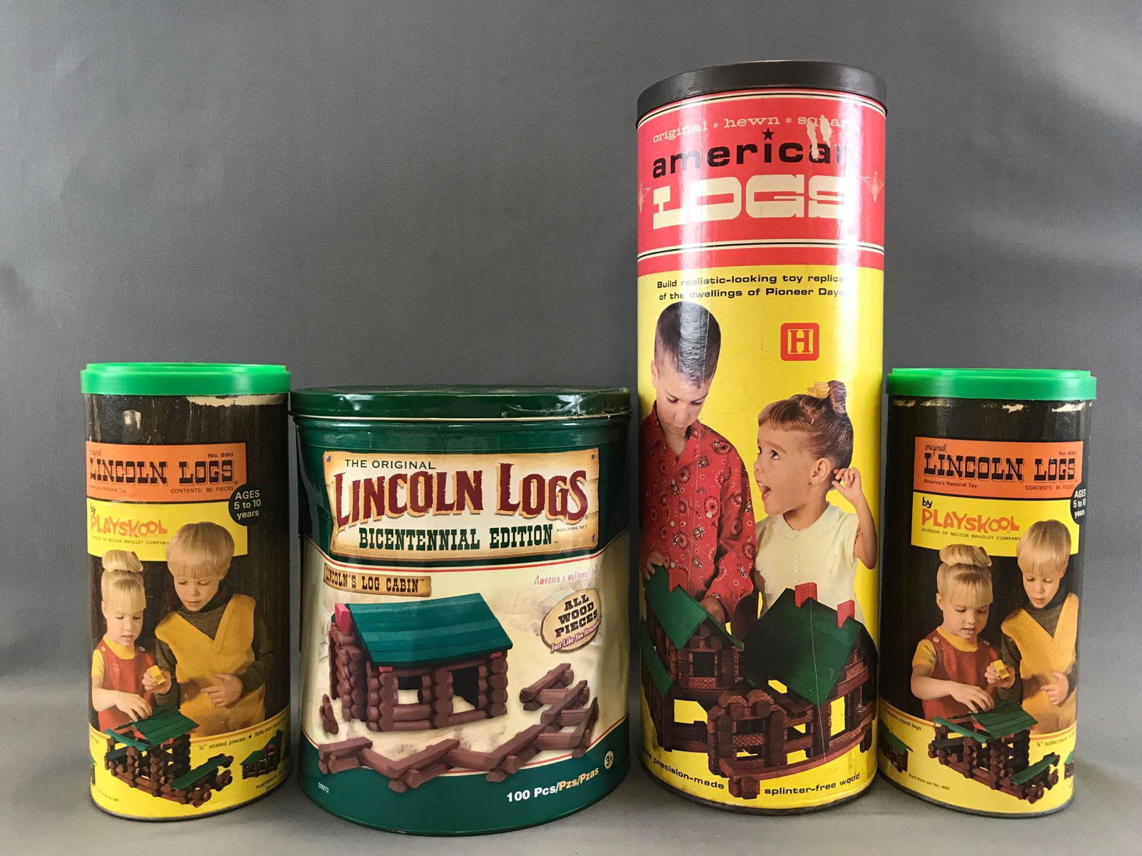 Group of 4 Sets: Lincoln Logs/ Construction Toys: Halsam Products American Logs, vintage and modern Lincoln Logs. Unknown completion. Largest is 7 x 19 1/4 inches