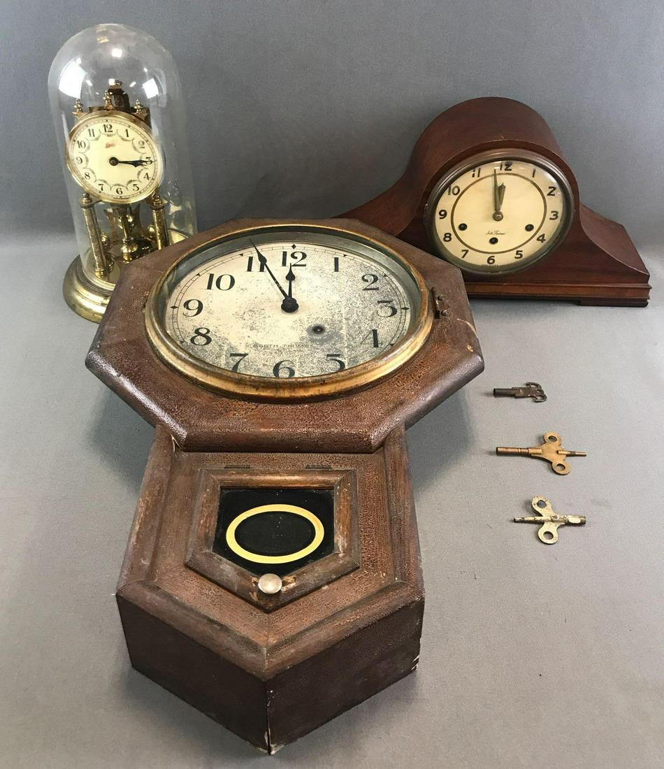 Group of 3: Vintage Clocks-Seth Thomas, Schatz: Lot includes a Seth Thomas wall clock and mantle clock and a Schatz anniversary clock. Largest is 14 1/4 x 4 x 21 inches; untested