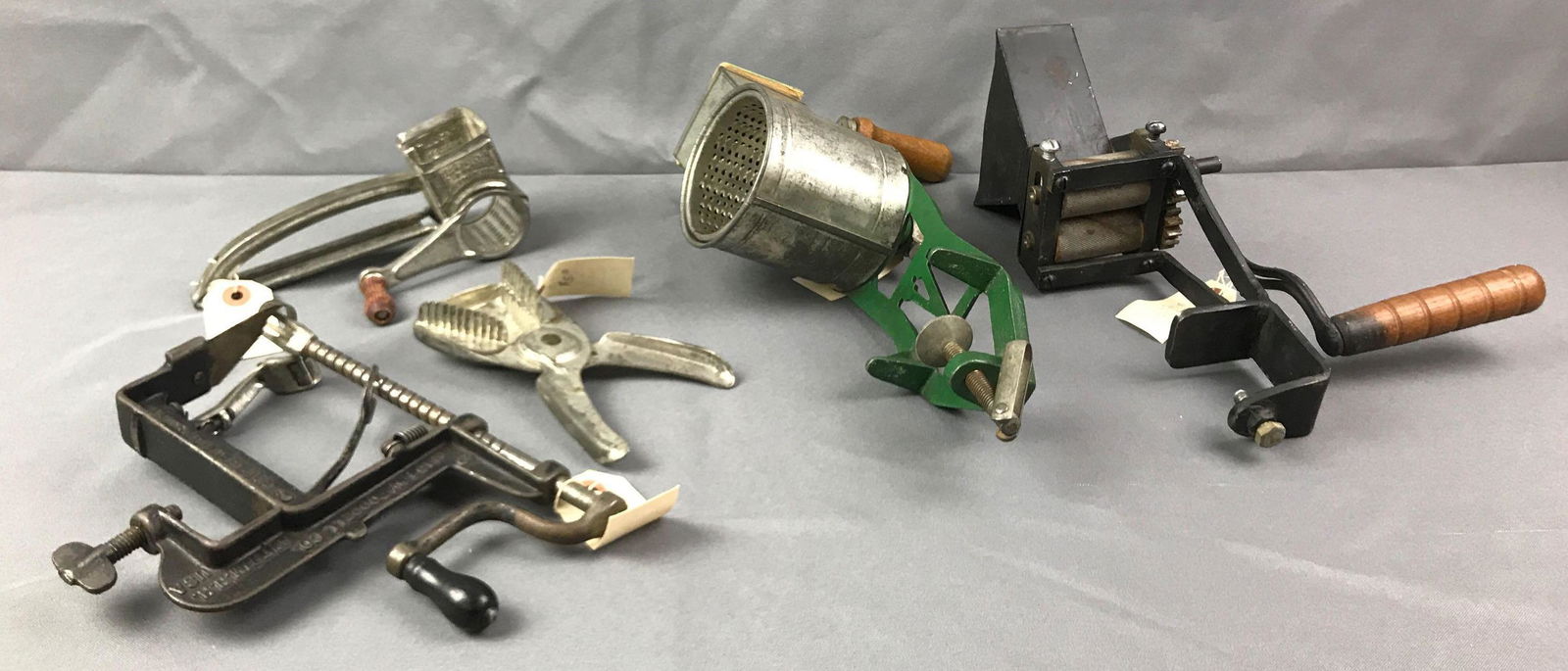 Group of 5 Antique Graters Apple Peeler: largest is 12 Inches