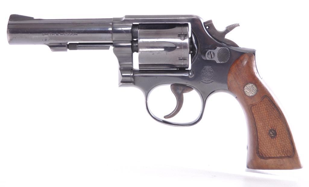 Smith & Wesson Model 10-8 38 S&W Special Revolver: Serial Number 9D38850, 4 inch Barrel, Original Grips, Double Action, 90-95% ConditionÊ