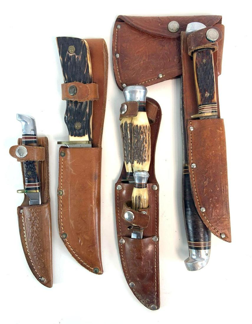 Group of 6 Fixed Blade Stag Handle Knives and a Hatchet: Largest 11 inches