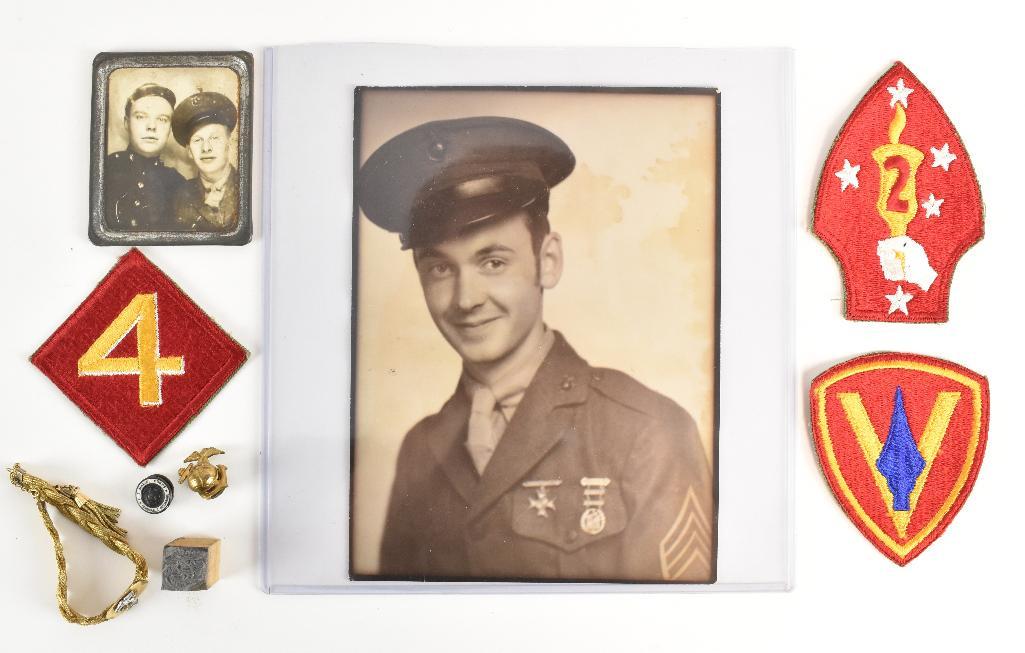 WW2 US Marine Corps Grouping: Includes Large Photo, Small Photo in holder from photo booth, heavy woman's type bracelet, discharge button, dress EGA, 2nd, 4th, and 5th Patches, and Wood EGA stamp