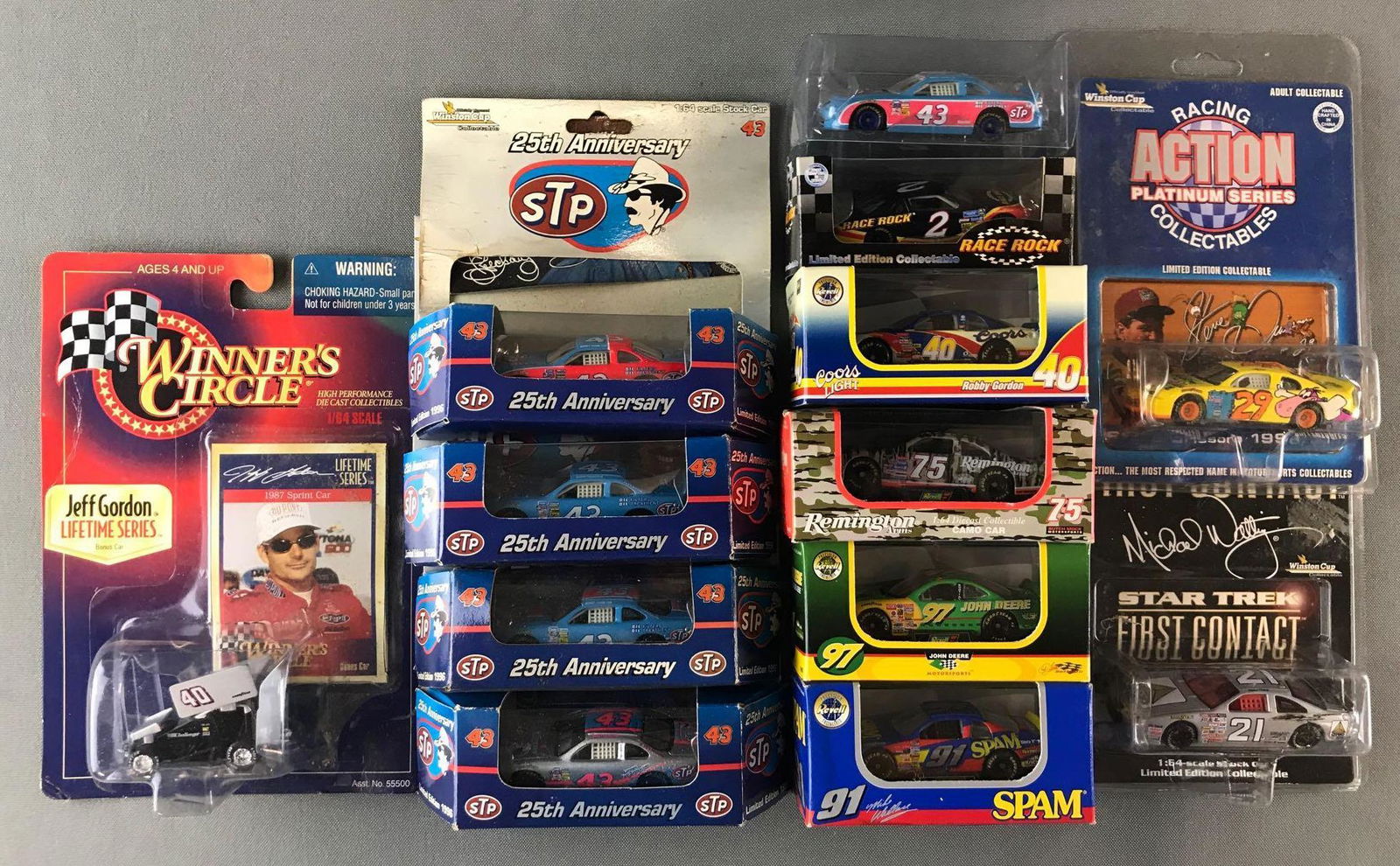 Group of 13 assorted die-cast NASCAR vehicles (1 of 6)