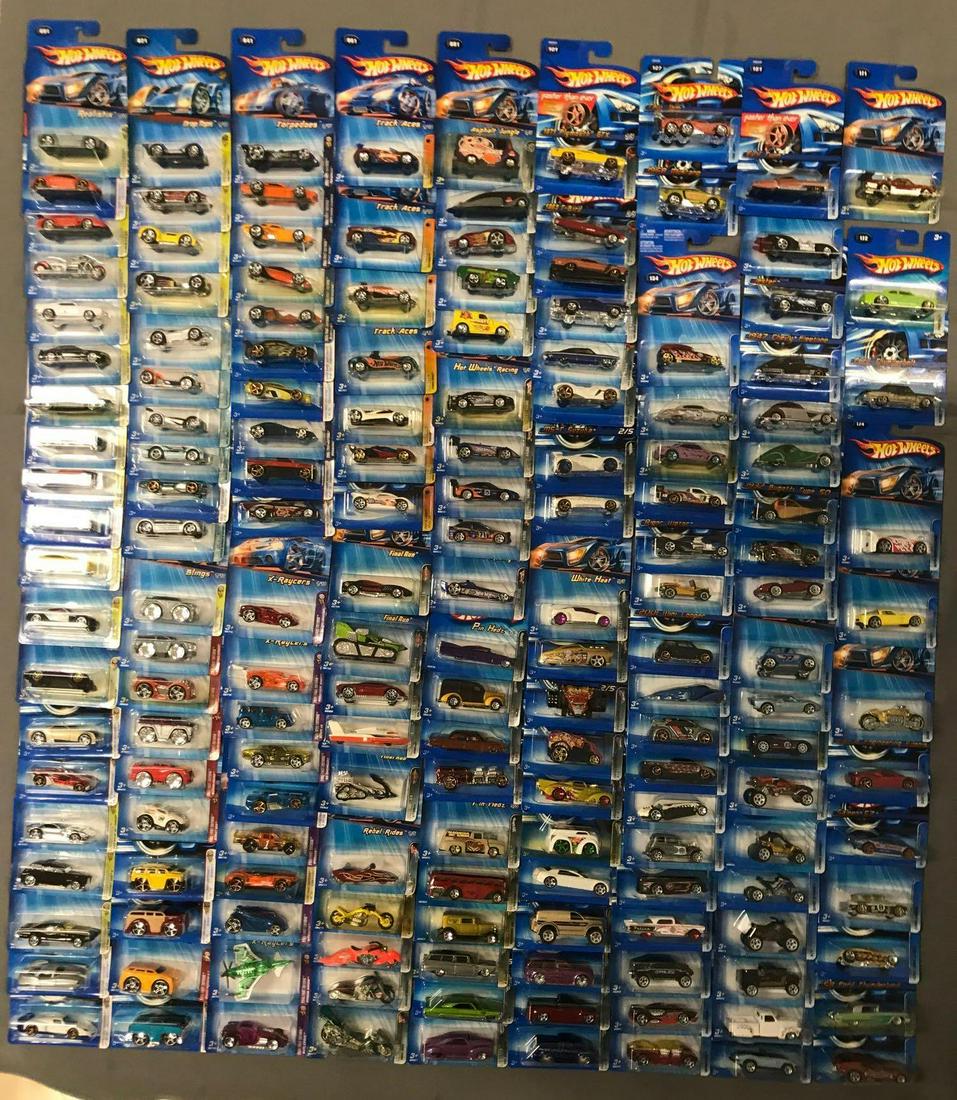 Group of 150+ 2005 Hot Wheels die-cast vehicles in: Lots 1-182 with the exception of lots 109, 120-126, 129-133, and 155. New in original packaging, includes multiple duplicates, package and color variations