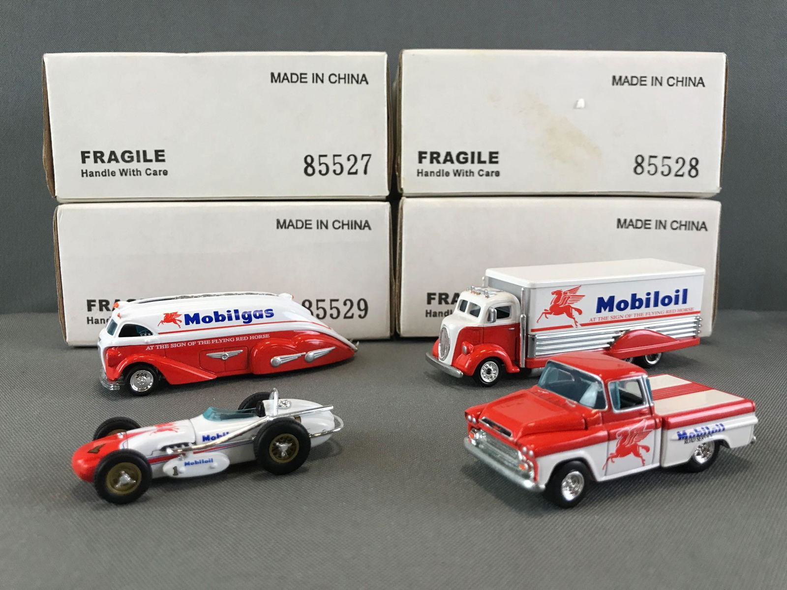 Group of 4 Hot Wheels Mobiloil/ die-cast vehicles (1 of 5)