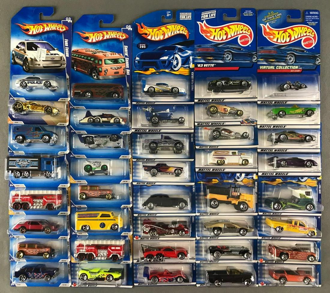 Group of 40 assorted Hot Wheels die-cast vehicles in: Includes Pikes Peak Celica, 63 Vette, 65 Mustang, and more