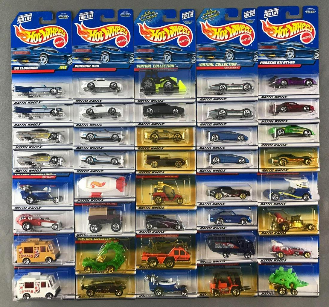 Group of 40 assorted Hot Wheels die-cast vehicles in: Includes Speed-a-Saurus, Semi-Fast, Lamborghini Diablo, and more