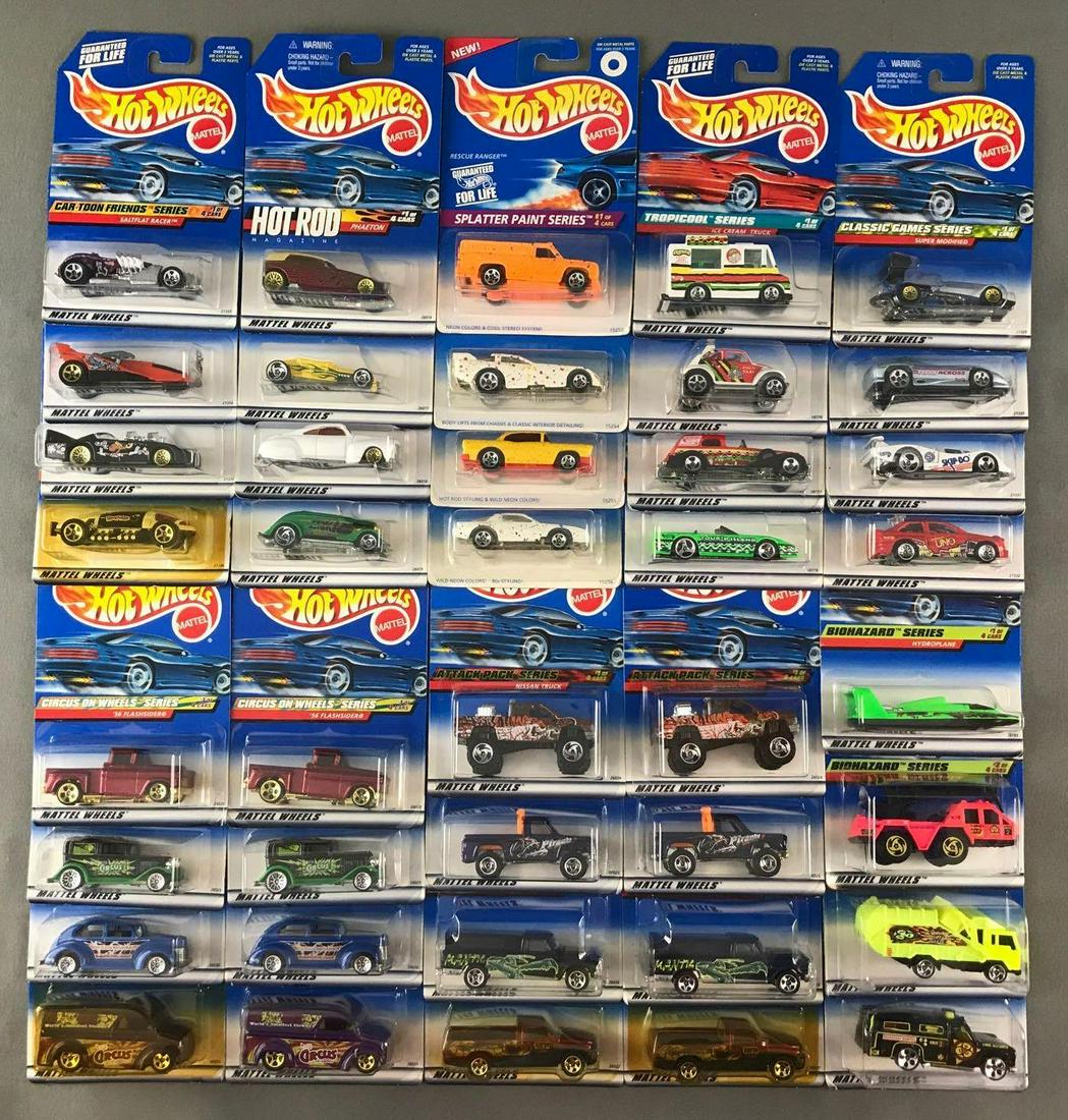 Group of 40 Hot Wheels die-cast vehicles in original: (10) 4-piece groups, includes Splatter Paint Series, Biohazard Series, Circus on Wheels Series, and more