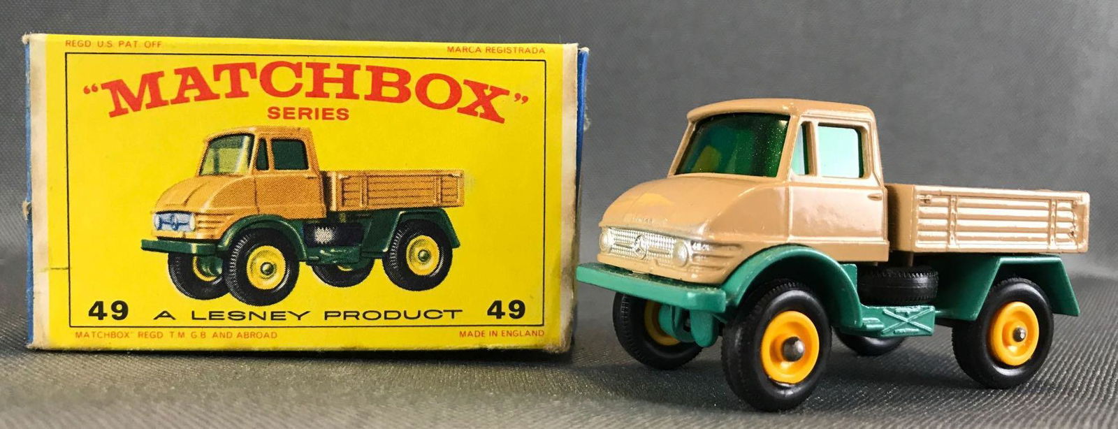 Matchbox No. 49 Unimog die-cast vehicle with original: Tan body, green base, green windows, BPW. A Lesney Product. Made in England, E Type BoxÊ