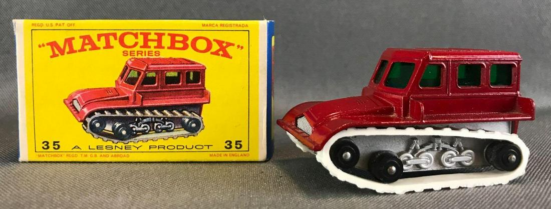 Matchbox No. 35 Snow-Trac die-cast vehicle with: Red body, silver base, green windows. A Lesney Product. Made in England,ÊE Type Box