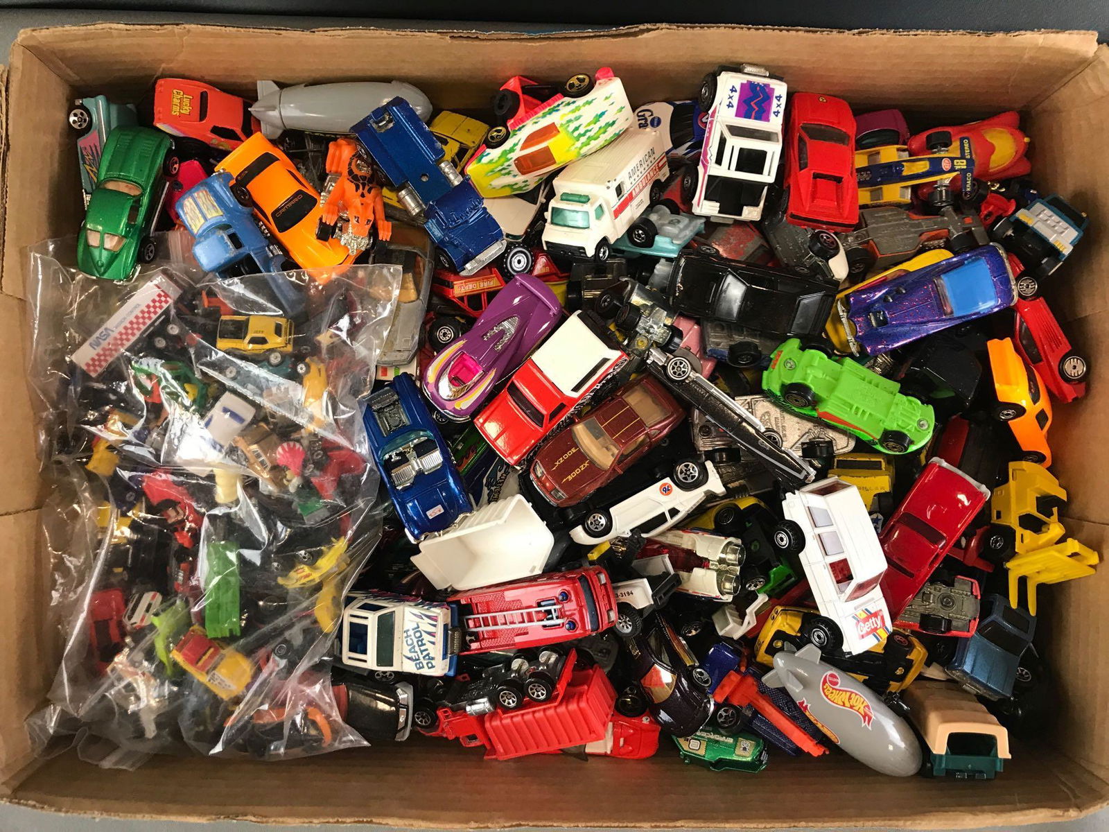 Group of assorted loose die-cast vehicles (1 of 5)